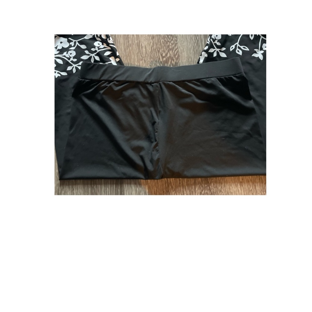 WORN ONCE! SUPER CUTE CAPRI PANTS WITH FLORAL HEM AND HOLE ACCENTS! - Picture 6 of 9